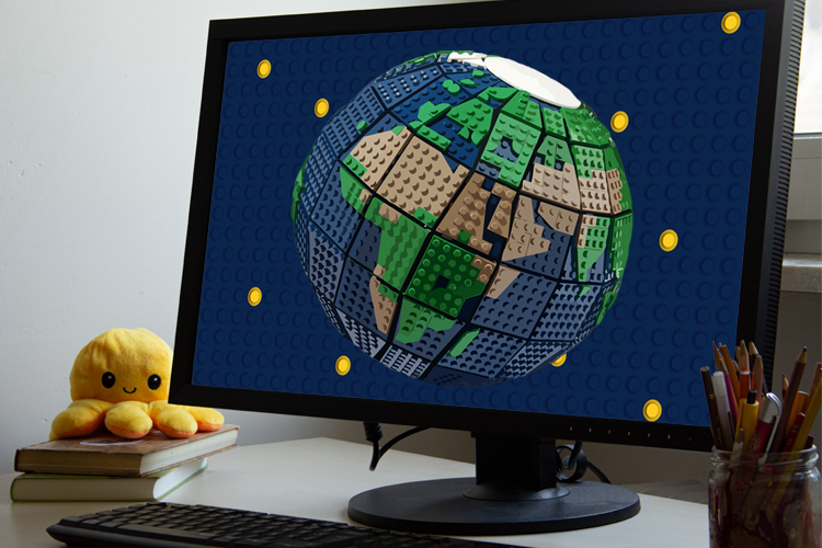ein Globus aus Kinder Lego-Steinen auf einem Computerbildschirm in einem Kinderzimmer